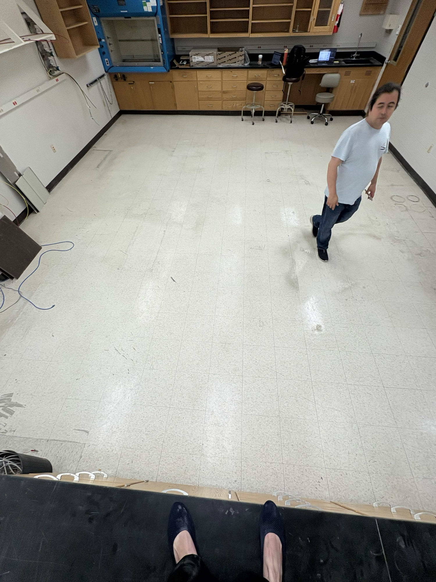 Looking down on the lab floor mid-setup